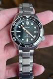 Seiko Prospex 140th Anniversary Limited Edition Automatic Scuba Divers Green Dial Silver Steel Strap Watch for Men - SPB207J1