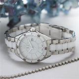 White ceramic watch with silver accents
