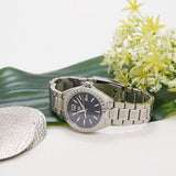 Luxury women's watch with diamonds and silver bracelet