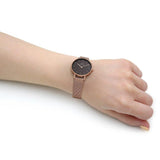 Brown XL Daniel Wellington watch on wrist