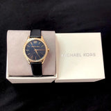 Michael Kors Layton Three Hand Mother of Pearl Black Dial Black Leather Strap Watch For Women - MK2911