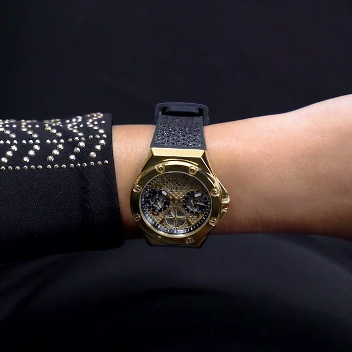 Gold watch on wrist