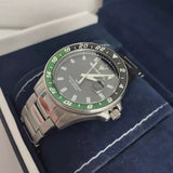 Zephyr watch with green bezel