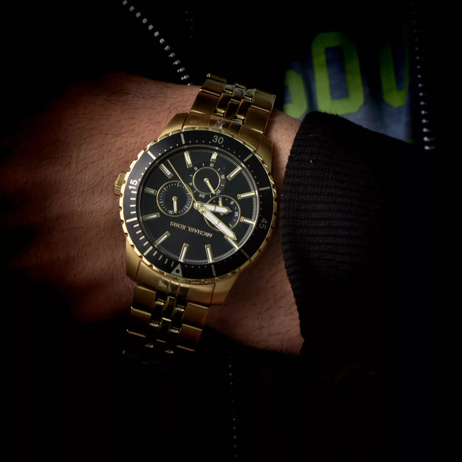Michael Kors Cunningham Multifunction Black Dial Gold Steel Strap Watch For Men - MK7154