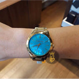 Michael Kors Slim Runway Blue Mother of Pearl Dial Gold Steel Strap Watch for Women - MK3492