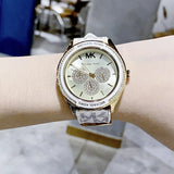 Michael Kors Jessa Multifunction Gold Dial White Leather Strap Watch For Women - MK7204