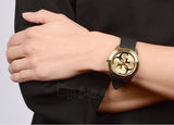 Guess G Twist Gold Dial Black Leather Strap Watch for Women - W0911L3