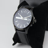 Black AX watch on display