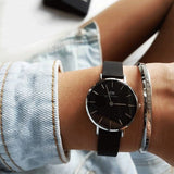 Daniel Wellington Petite Ashfield 28mm black watch on wrist