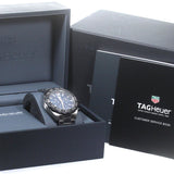 Tag Heuer watch in box with paperwork