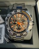 TAG Heuer watch with orange accents and tachymeter