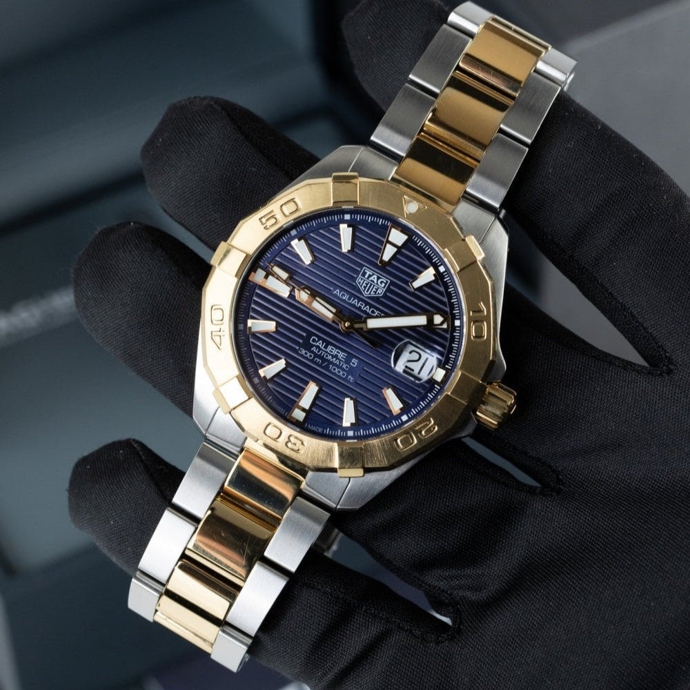 Tag Heuer Aquaracer WBD2120 watch with blue dial and gold accents