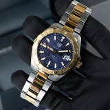 Tag Heuer Aquaracer WBD2120 watch with blue dial and gold accents