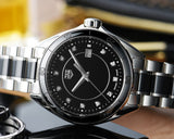 TAG Heuer watch tg871_im_8849d13d with black face and diamond accents
