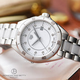 TAG Heuer white ceramic watch with diamonds