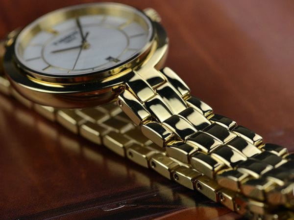 Tissot Flamingo Mother of Pearl White Dial Gold Steel Strap Watch For Women - T094.210.33.111.00
