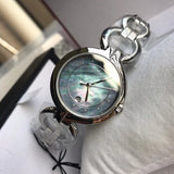 Tissot T Lady Flamingo Mother of Pearl Blue Dial Silver Steel Strap Watch for Women - T094.210.11.126.00