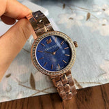 Swarovski Daytime Glittering Blue Dial Rose Gold Steel Strap Watch for Women - 5182277