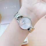 Calvin Klein silver watch on wrist