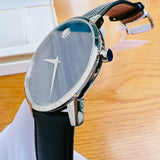 Movado watch with black leather strap