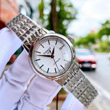 Tissot 1853 Automatic watch with white face and silver band