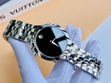 Movado watch with black face and silver bracelet