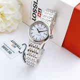 Tissot automatic watch with stainless steel band, retail $695.00
