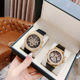 Gold Guess watches in gift box