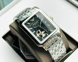 Armani Exchange men's watch with silver band and open heart design