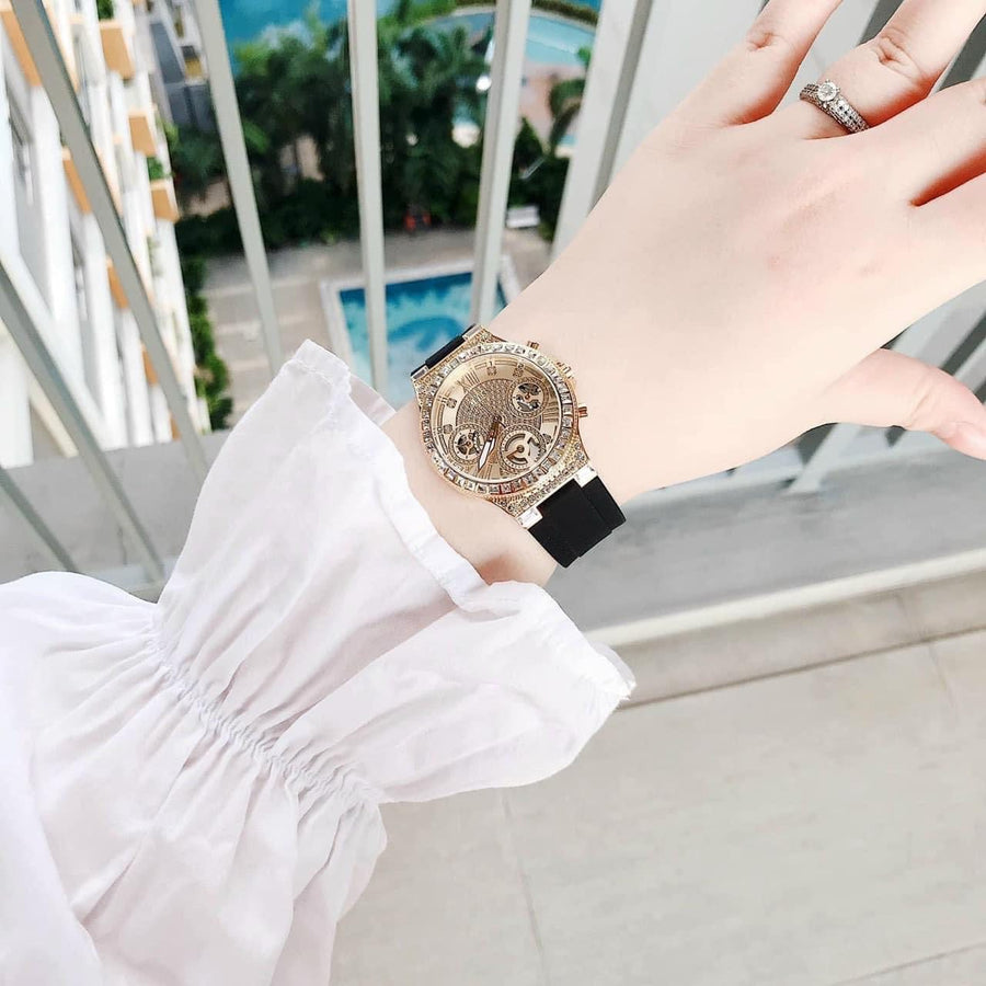Gold watch on wrist, z4839065206527