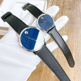 Two Movado watches with blue and white faces